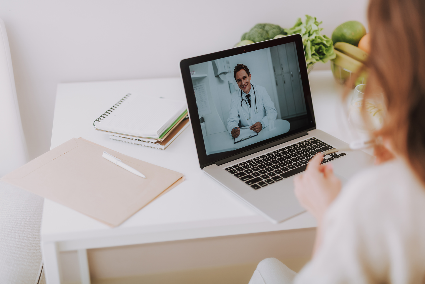 A woman on a virtual visit with a doctor
