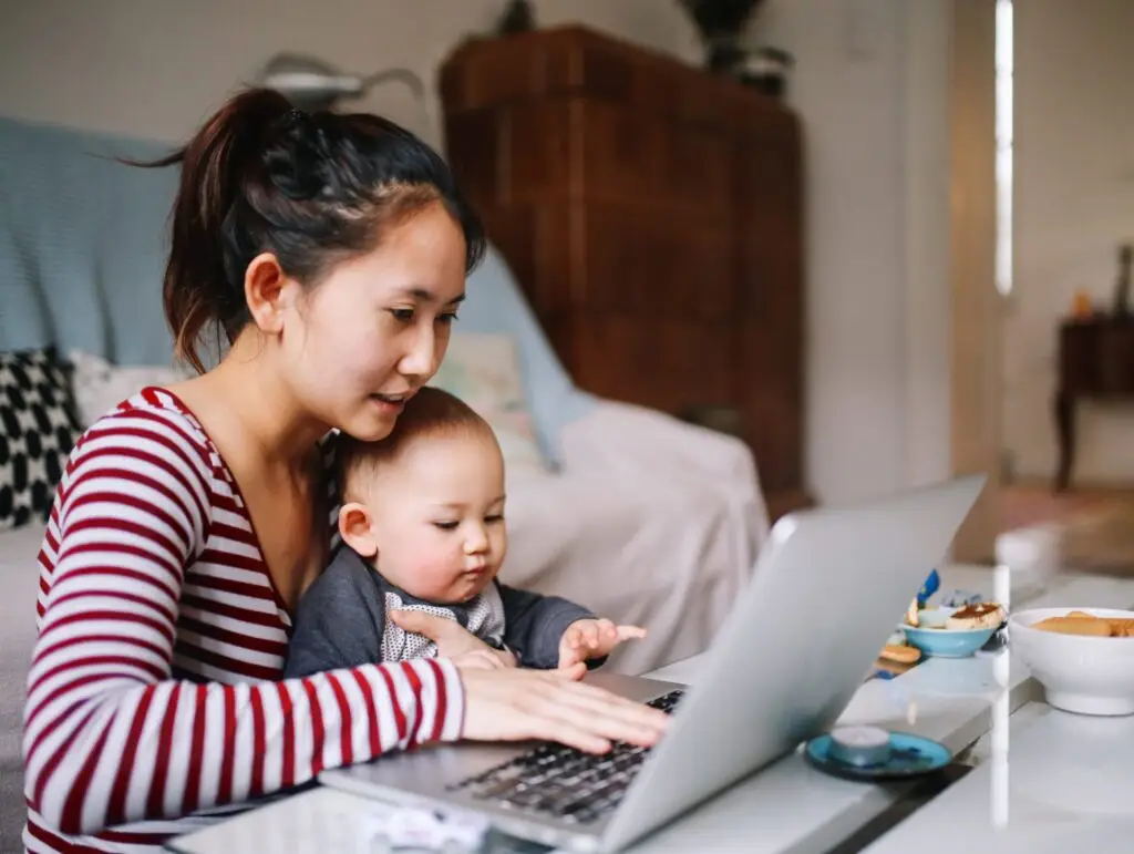 Mom and baby on a computer