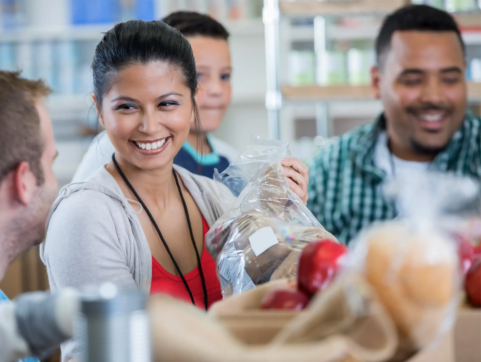 Group of people volunteering at a food bank