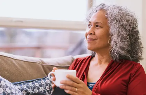 Woman holding a coffee mug