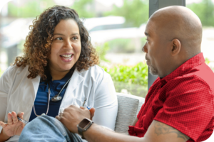 A man talking with their doctor