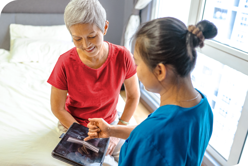 A doctor talking with a patient during a visit.
